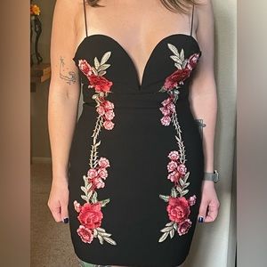 Luxxel Black Bodycon with Rose details and deep V neck